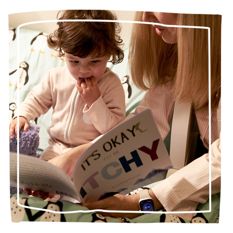 Mum reading child bedtime story