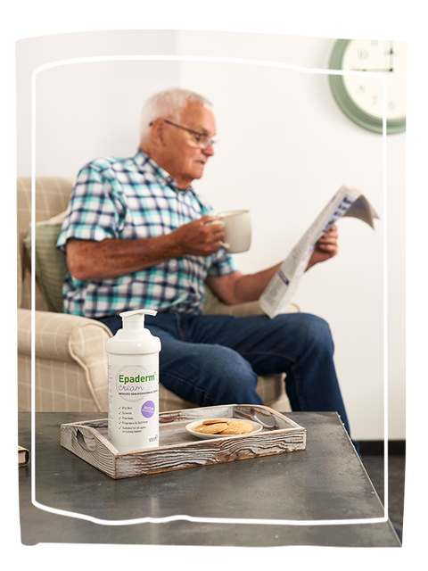 Man having coffee reading the newspaper