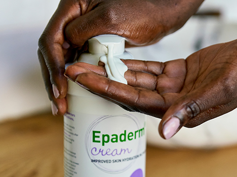 Women dispensing Epaderm cream into her hand